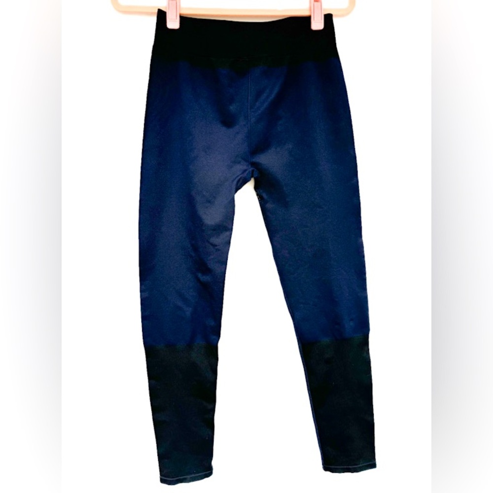 Fabletics, high-waisted legging, dark navy blue and black color block  Size: L